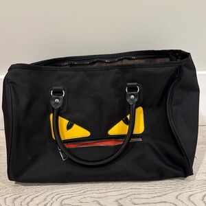 Black Men’s Tote Bag with Yellow Accent Eyes monster eye duffel bag